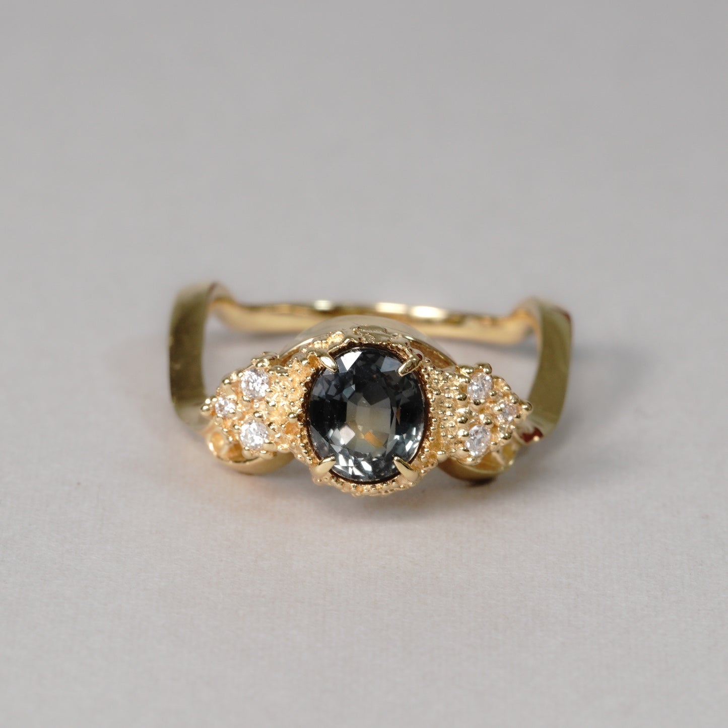 001 Color change sapphire / Diamond Ring